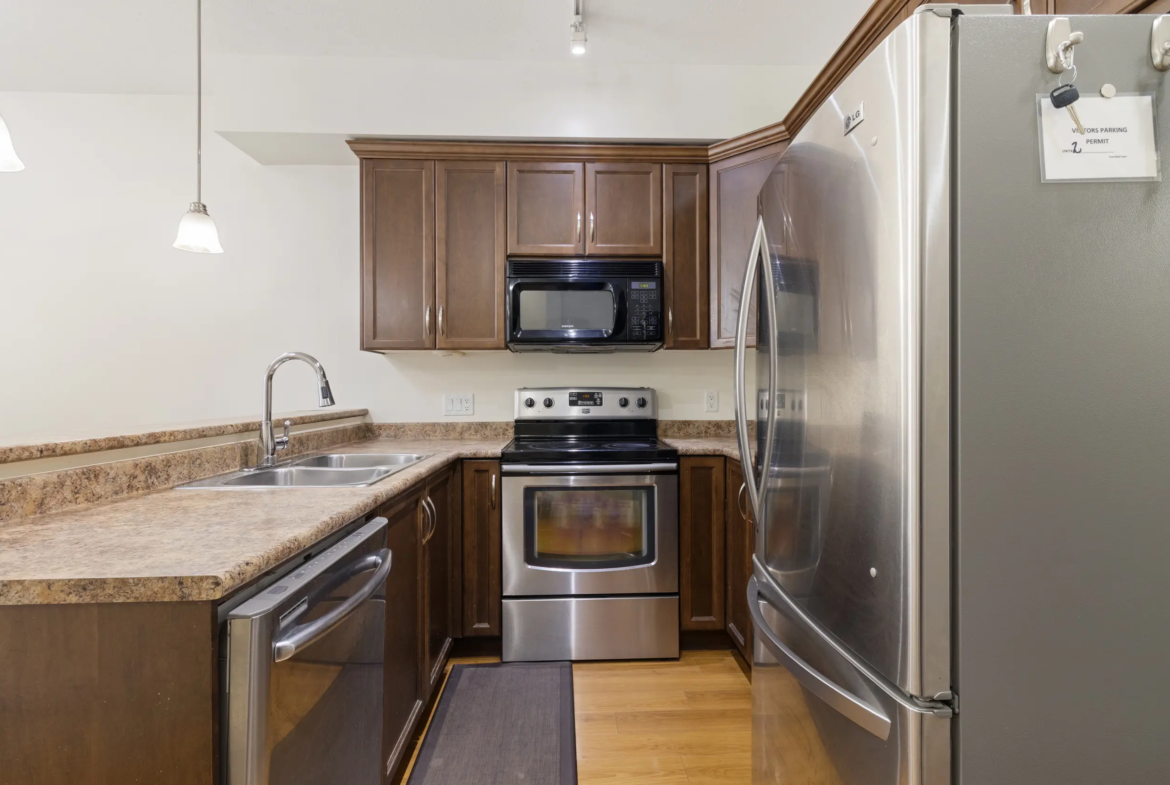 Modern kitchen with ample cabinetry at 2 9140 HAZEL STREET