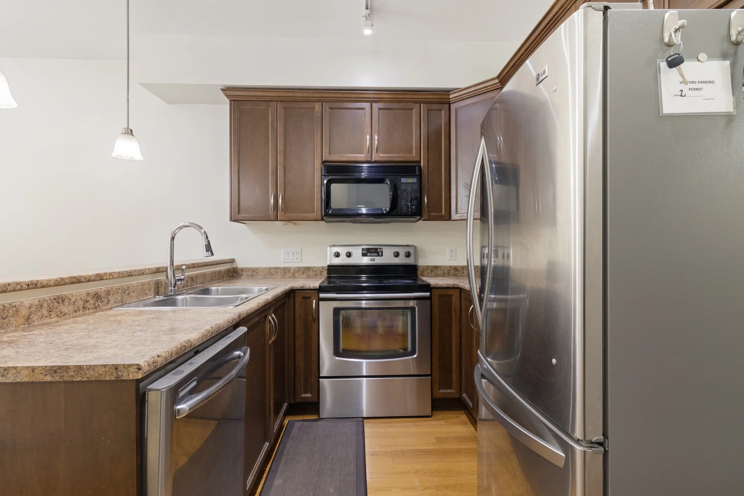 2 9140 HAZEL STREET (11) Modern kitchen with ample cabinetry at 2 9140 HAZEL STREET