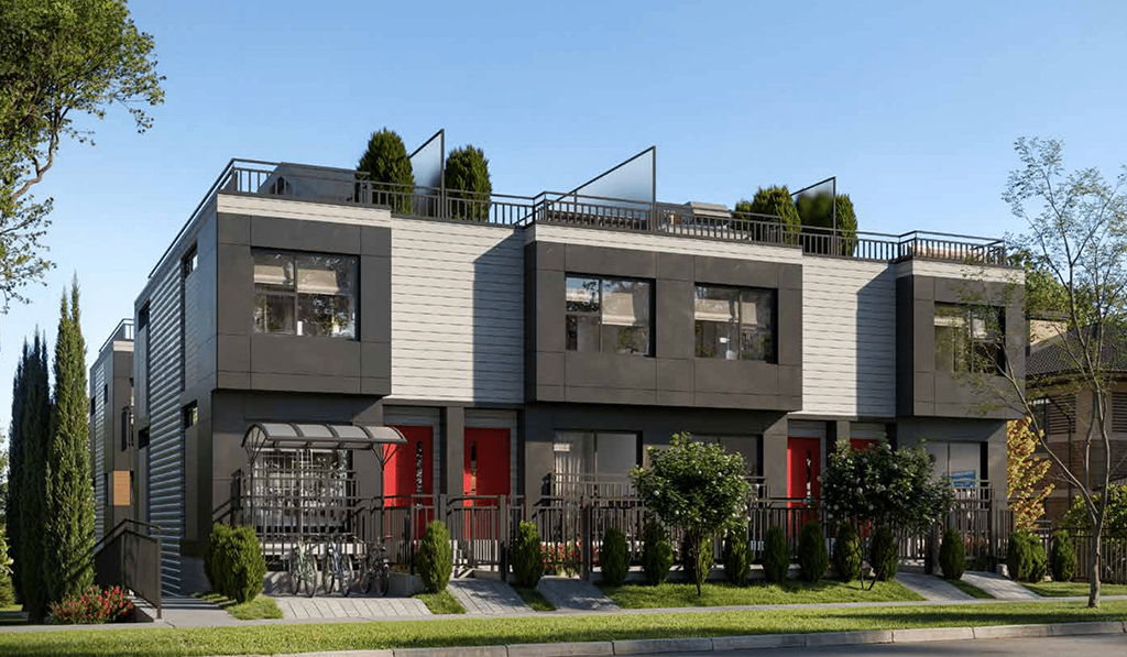 Street view of Rouge Townhomes featuring private entry and garage