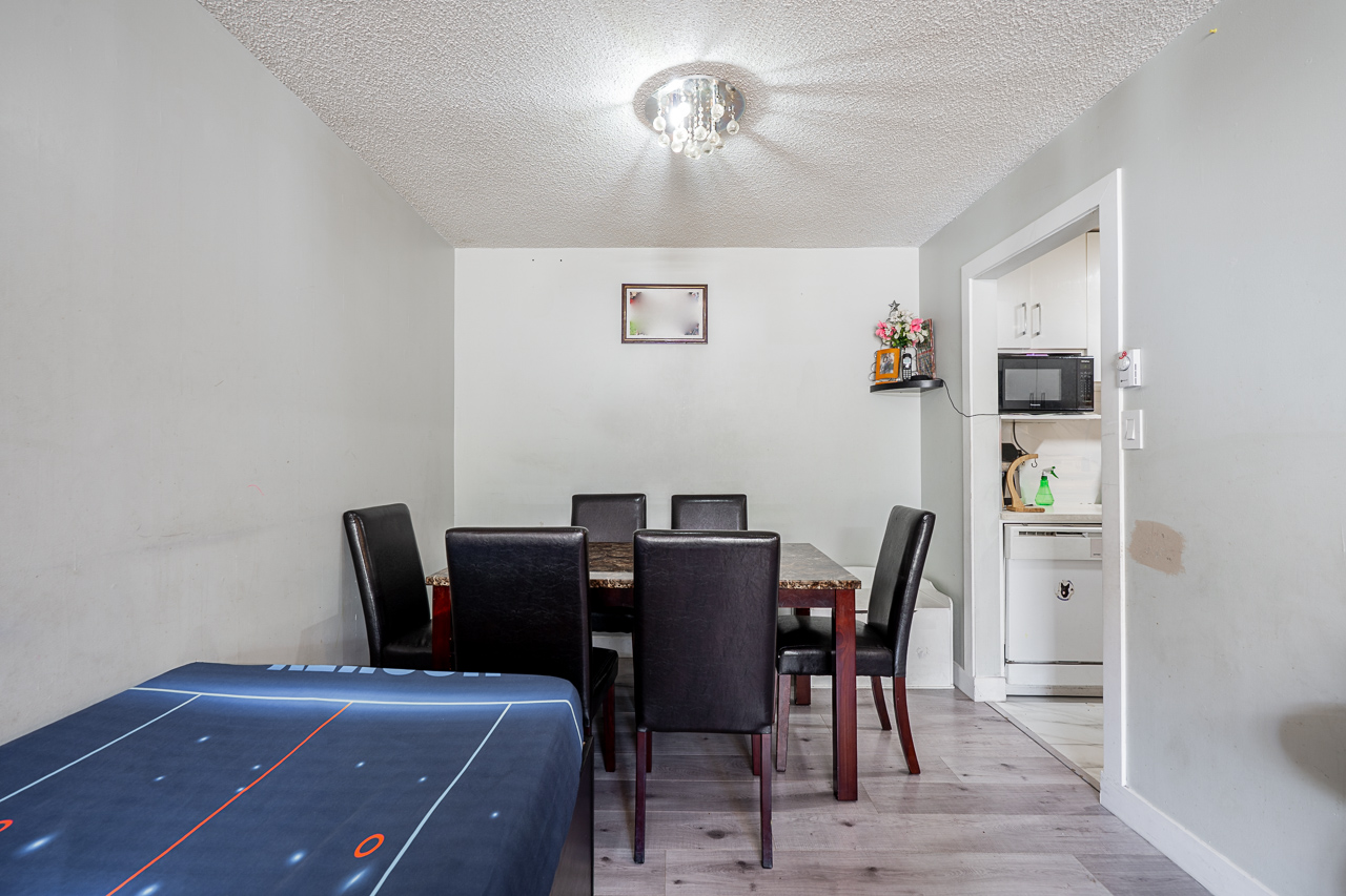 Unit 104 13915 72 Avenue Surrey-13 Bright dining area at 104 13915 72 Avenue, Surrey with space for a full dining set.