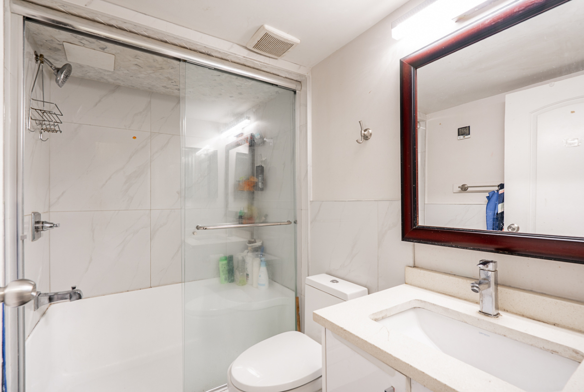 Modern bathroom at 104 13915 72 Avenue with clean vanity and updated fixtures.