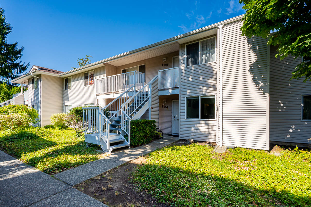 Unit 104 13915 72 Avenue Surrey-6 Exterior view of 104 13915 72 Avenue, Surrey showcasing well-maintained townhouse facade.