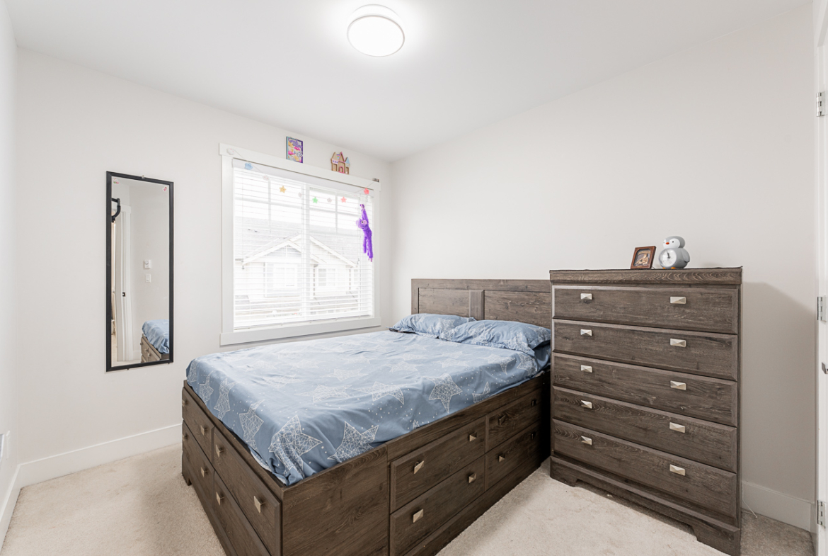 Bright bedroom at 170 13898 64 AVENUE townhome