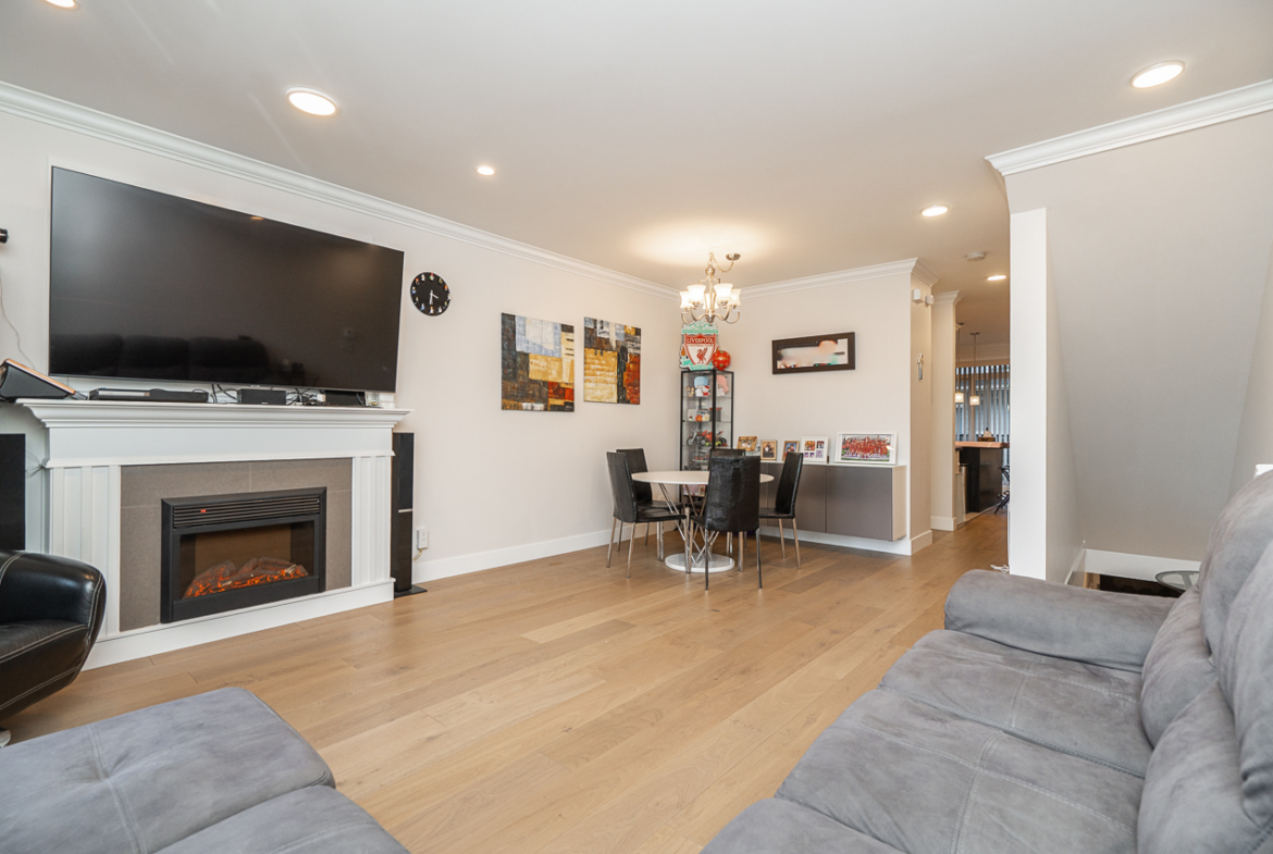 Bright living room at 30 6383 140 STREET townhome