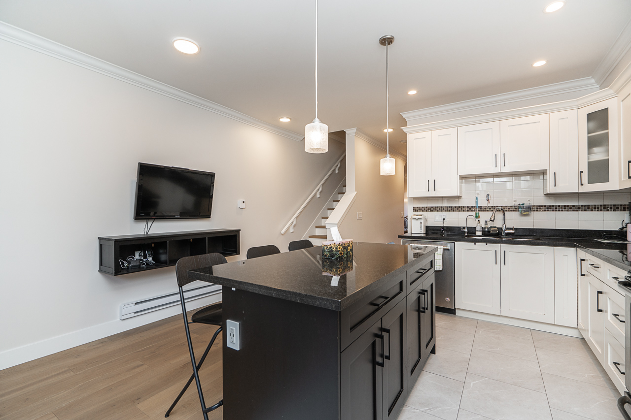 Unit 30 6383 140 Street Surrey (20) Open-concept kitchen with stainless appliances at 30 6383 140 STREET