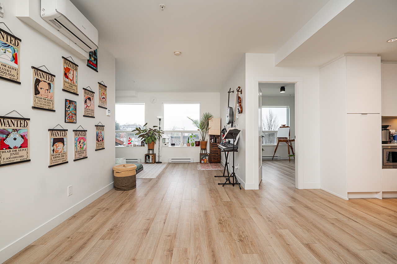 Unit 301 2493 Montrose Avenue Abbotsford-11 Bright open-concept living room with large windows and city views