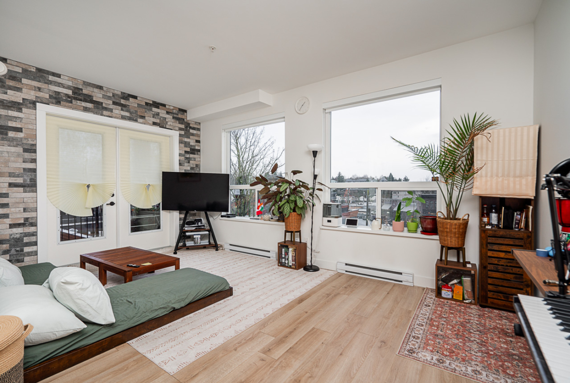 Modern living area connected to dining and kitchen space