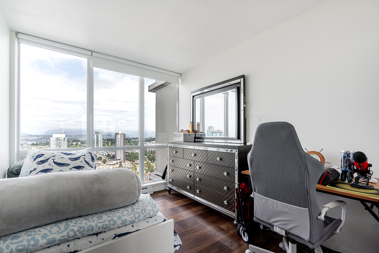 Living area with natural light and high-rise perspective
