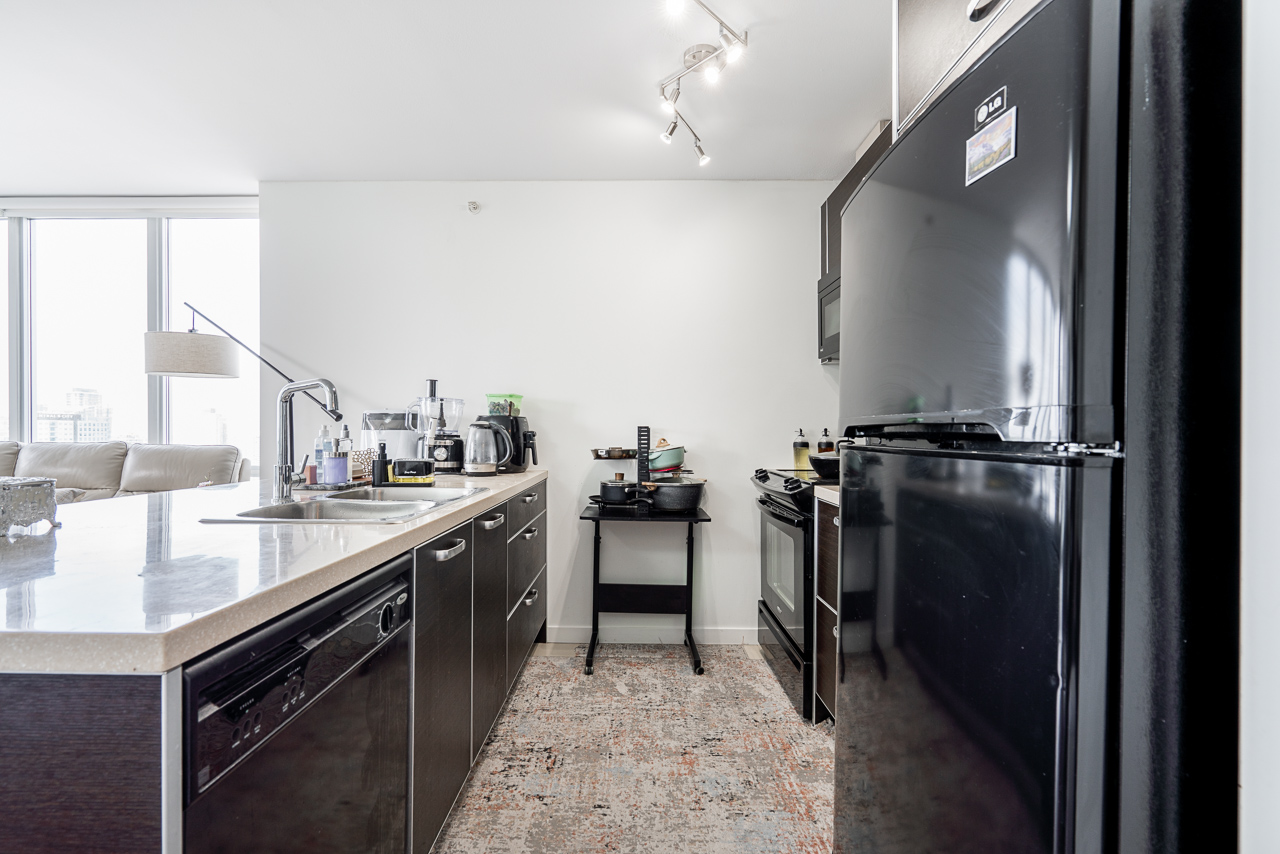 Modern kitchen with sleek cabinetry and stainless steel appliances