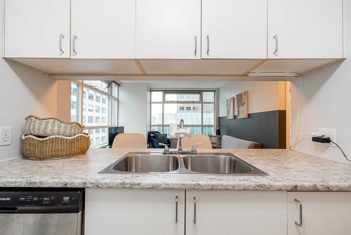 Modern kitchen at 504–438 Seymour Street condo in Vancouver