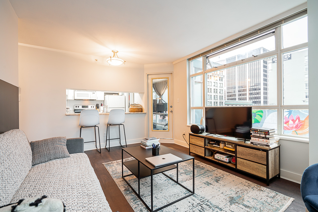 Unit 504 438 Seymour Street Vancouver-15 Bright living room at 504–438 Seymour Street condo with city views