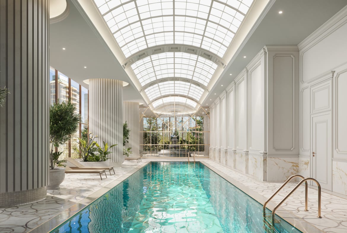 Indoor crystalline pool with glass ceiling and classical European architecture at Greenhouse Burnaby