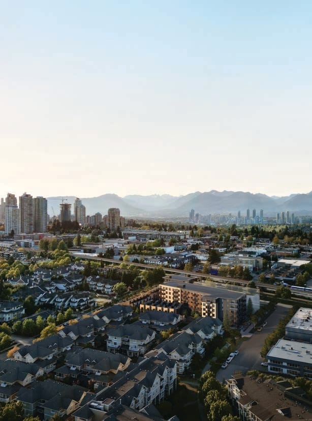 Aerial view of Koen by Beedie in South Burnaby with Metrotown skyline and mountain views