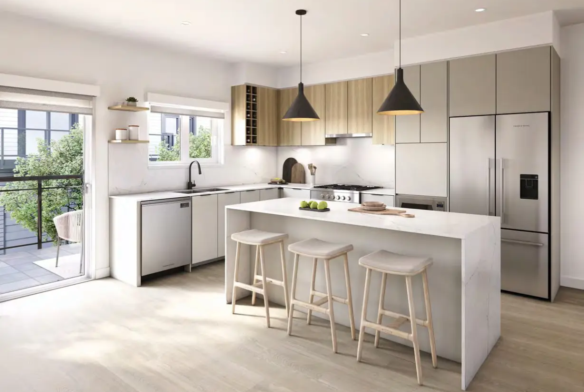 Bright open-concept kitchen with island and premium appliances