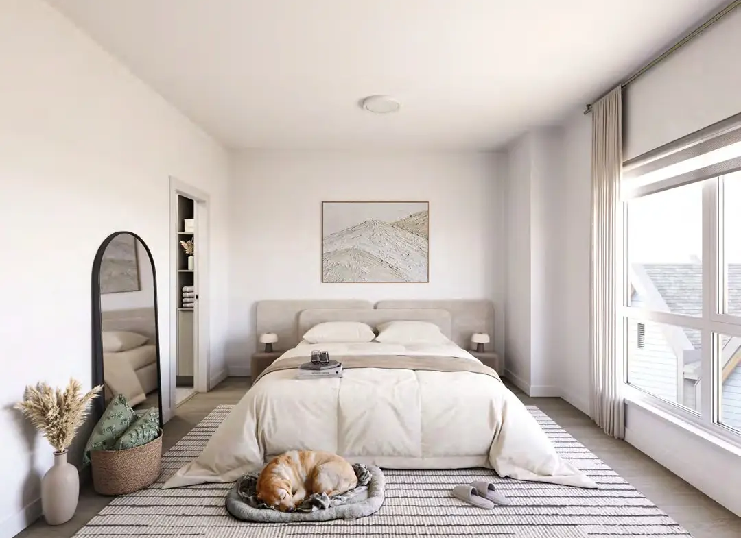 Spacious bedroom with natural light and minimalist design