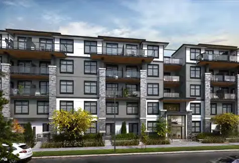 Contemporary low-rise condo building exterior with balconies at Culmena