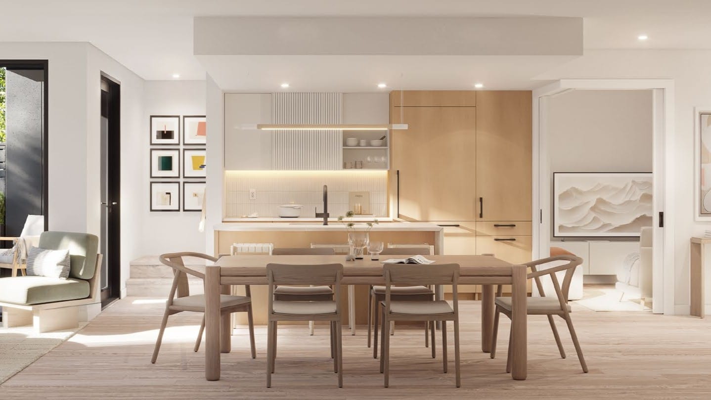 Open concept kitchen and living space with natural light Line House Vancouver