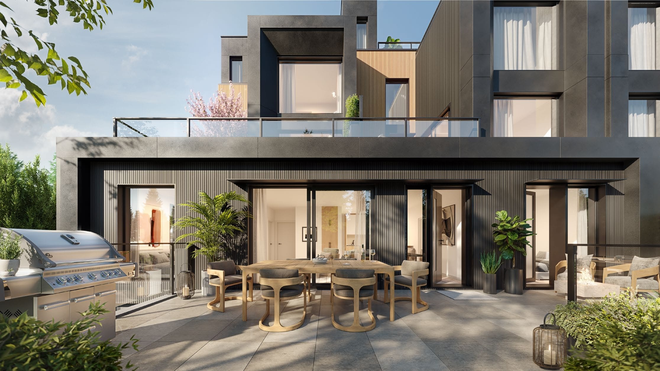 Indoor-outdoor patio living with glass doors and greenery Line House