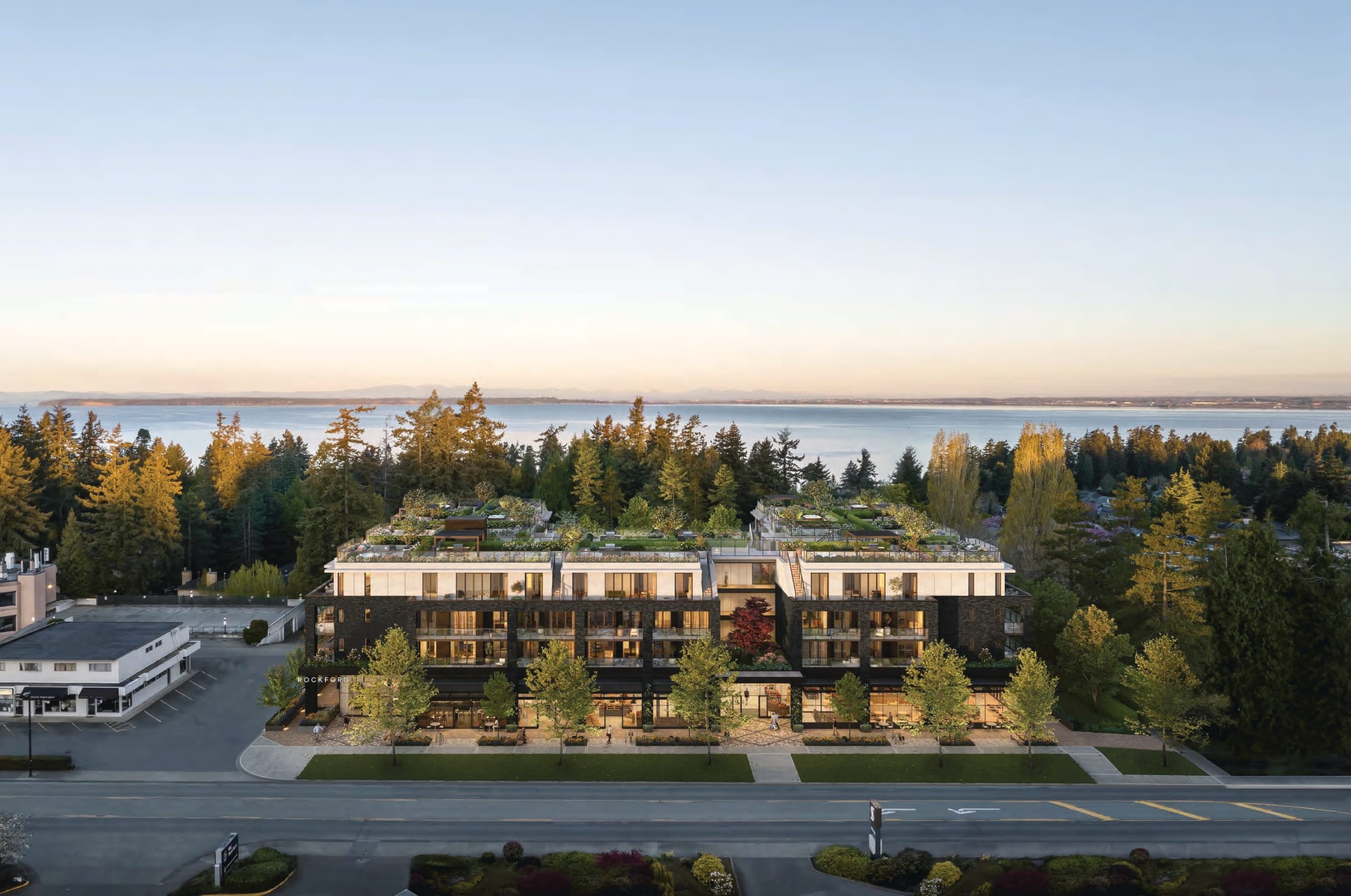 Rockford by Cressey courtyard view with landscaped gardens, seating areas, and children’s play space in Ocean Park Surrey