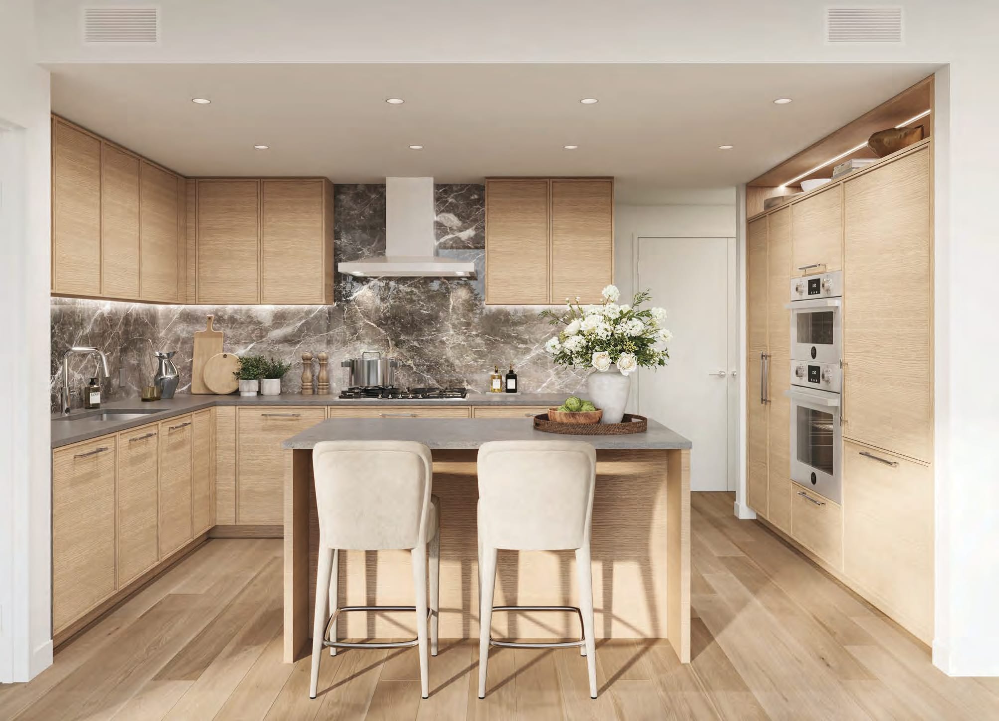 Rockford open concept living room and kitchen with wood finishes, island seating, and contemporary interior design